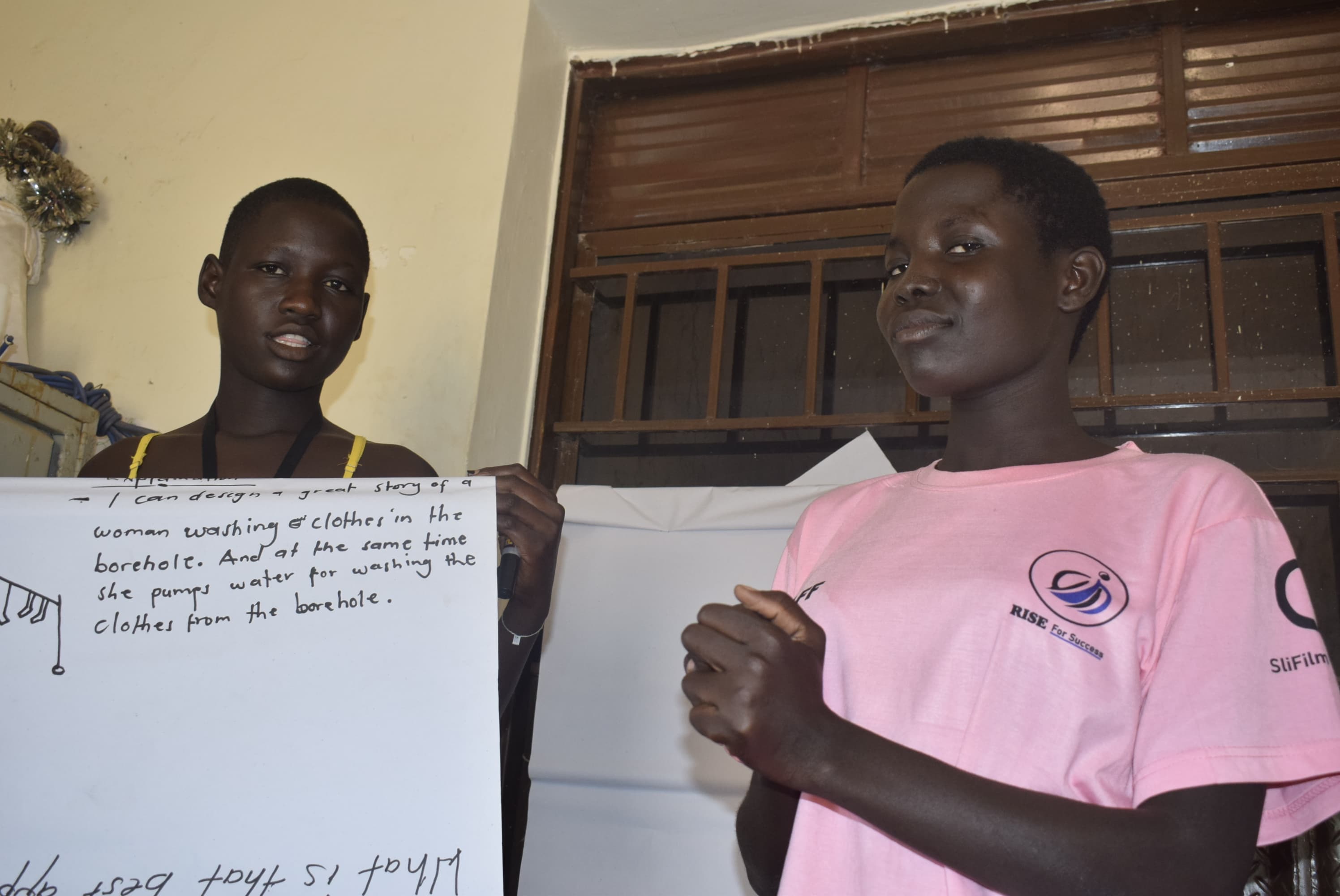 RFS photography and storytelling workshop participant in Bidi-Bidi Settlement
